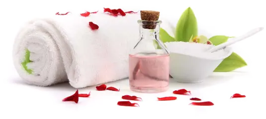 Personique on the Spot Specials - photo showing massage oils, minerals and flower petals