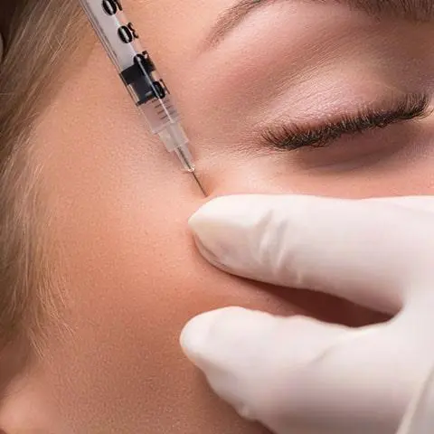 Close up BOTOX facial injection